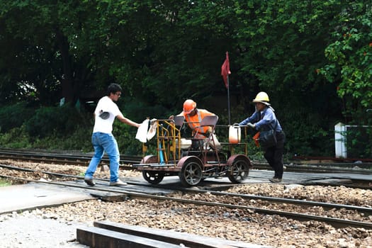 Bangkok, Thailand - September 5, 2015 : Unidentified railway employees working for checking of railway tracks at State Railway of Thailand.