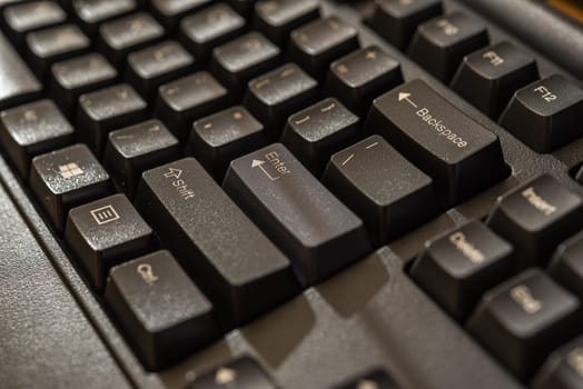 Keyboard for computer server or desktop computer focus on shift button on a keyboard in office, business and information technology concept