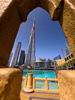 UAE, Dubai, 10 December 2024: The famous Burj Khalifa skyscraper at sunny day, Dubai's sights during the incredible blue sky. High quality photo