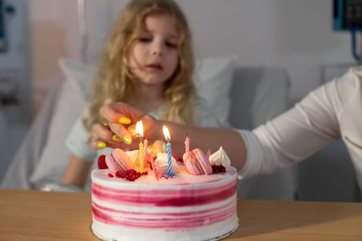 A very joyful moment of a child celebrating a delightful birthday with a beautifully colorful cake and lit candles