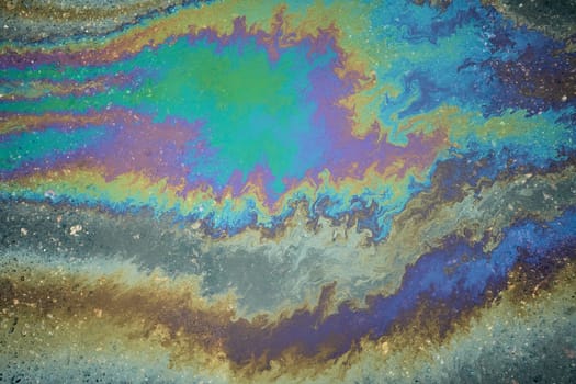 Colorful oil slick creating a mesmerizing abstract pattern.