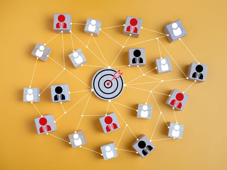 Dartboard and red arrow connection linkage with human icon for customer focus target group and customer relation management concept. Target customer, Marketing plan and strategies.