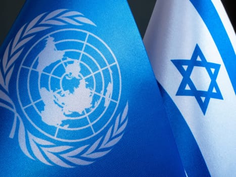 KYIV, UKRAINE - October 11, 2023. Close-up of the UN and Israeli flags. Editorial.