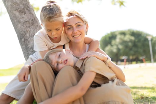 Happy family enjoying a sunny day in the park together
