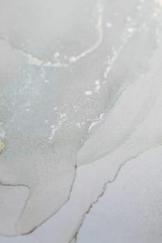 Soft blended colors in this alcohol ink piece create an abstract design that evokes feelings of calm. The graceful flows and textures invite viewers into a tranquil artistic experience.
