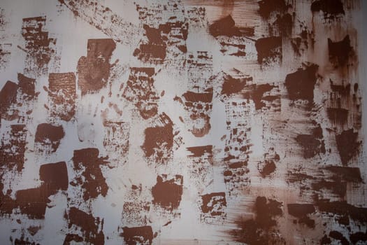 A unique and captivating abstract texture that showcases intricate brown patterns set against a gray background