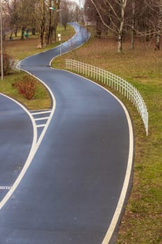 Jogging, walking, cycling path in the park