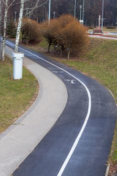 Jogging, walking, cycling path in the park.