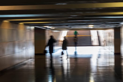 Conceptual, black and white shot of the exit from underground pedestrian crossing