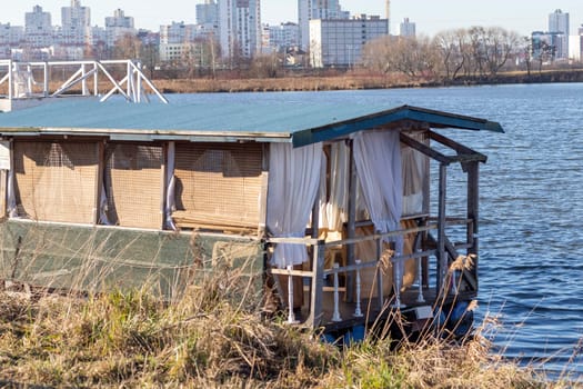Shot of the abandoned cafe on the bank of the river