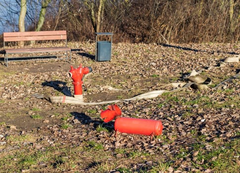 Close up shot of the fire fighting hydrant and hose