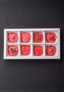 Delicious sweet mochi in the shape of red hearts for the holiday of Valentine's Day