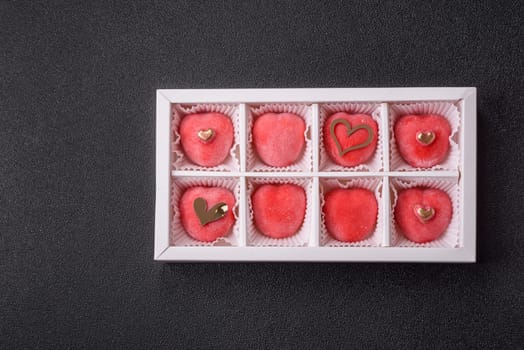 Delicious sweet mochi in the shape of red hearts for the holiday of Valentine's Day