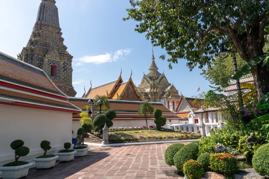 Explore Bangkoks magnificent temples and lush gardens, surrounded by a tranquil and serene atmosphere