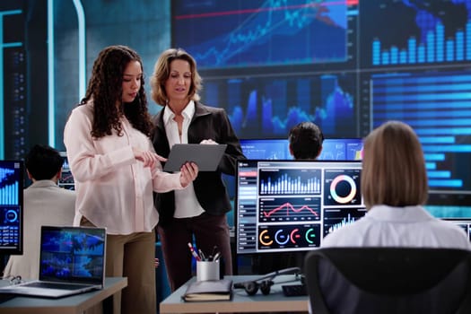 Financial Advisor Analyzing KPI Dashboard on Black Business Server