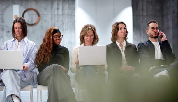Diverse Group of Professionals Waiting for Job Interview in Office.