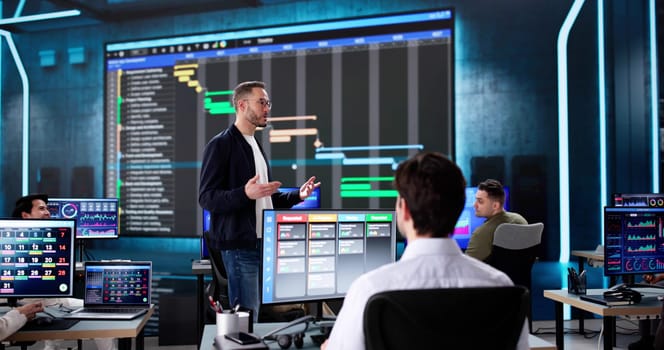 Corporate training in a classroom with Gantt schedule chart