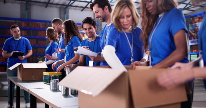 Diverse Community Group Organized Food Donation at Nonprofit Warehouse.