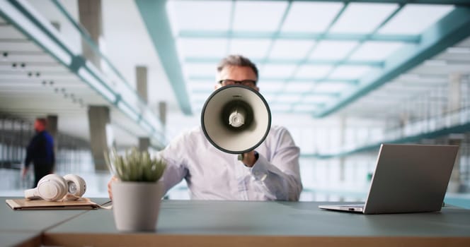 Man Making Megaphone Announcement. Warning Concept Speaker
