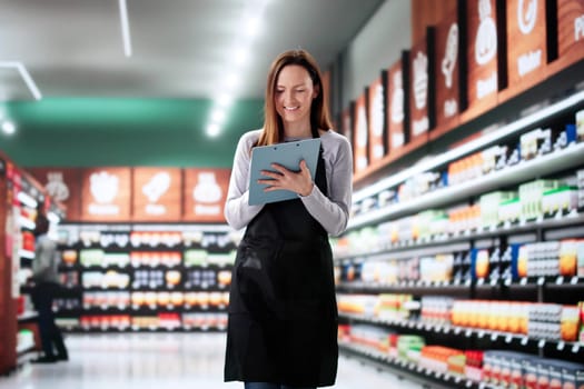 Woman Managing Inventory in Supermarket Store, Training New Employees.