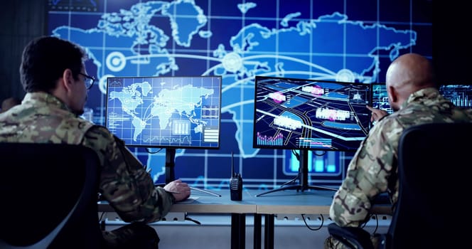 Cyber Technology Expert Monitors Security Cameras In Government Control Center.