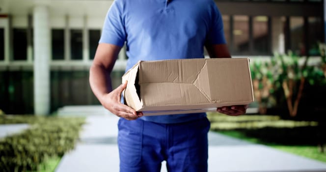 Fragile Package Delivery Disaster: Mailman's Mistake Destroys Shipment, Showing Liability.