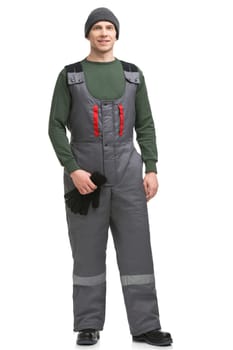 Man in workwear and cap isolated full-length view