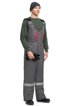 Male in workwear and cap isolated full-length view