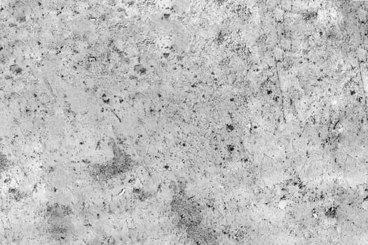 Texture of old concrete wall damaged by weather and time.