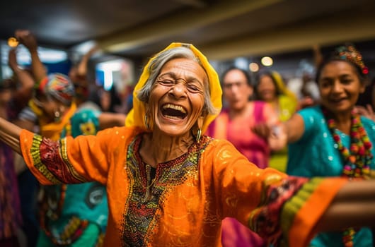 Big Family Celebrating Diwali Indian Family elderly in Traditional Clothes Gathered Together dancing having fun. Indian Moment of Happiness on a Hindu Holiday Party