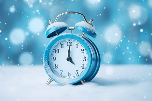 Alarm clock on the background of a winter landscape. Transition to winter time. The concept of Christmas.