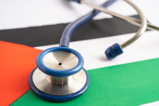 Stethoscope on Palestine flag background, Business and finance concept.