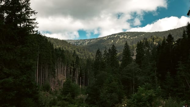 Mountain Peaks Under a Dramatic Sky. High quality photo