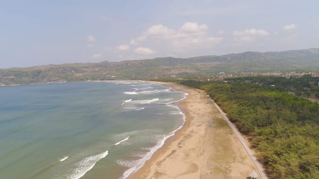 aerial seascape sand beach with turquoise water, Teleng Ria, Pacitan. Seascape, ocean and beautiful beach. Java Indonesia Travel concept.