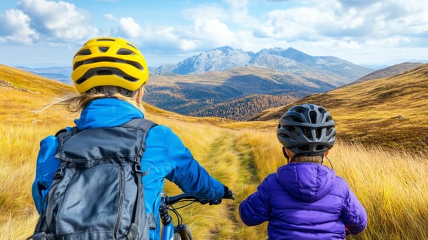 Two cyclists enjoying a sunny autumn day in the mountains riding their mountain bikes along a scenic trail