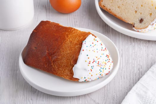 Traditional easter cake or sweet bread and eggs in white table Easter treat,Holiday symbol.