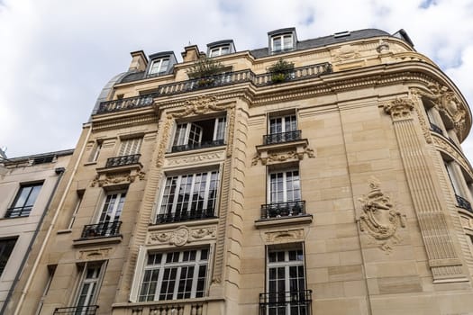 Facade of residential building in Paris, France. High quality photo