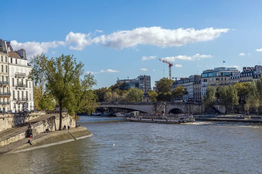 Beautiful view of Paris with buildings and river. Paris, France - February 10, 2025