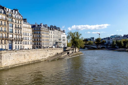 Beautiful view of Paris with buildings and river. Paris, France - February 10, 2025