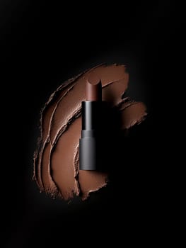 lipstick. Black background.