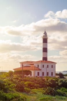 view of the lighthouse against a blue sky in Portocolom Mallorca, Balearic Islands,Spain