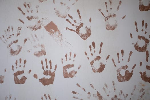 The prehistoric cave art displays remarkable handprints that reflect ancient human culture and history