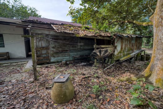 image around a vacant dilapidated house stands alone at the plantation