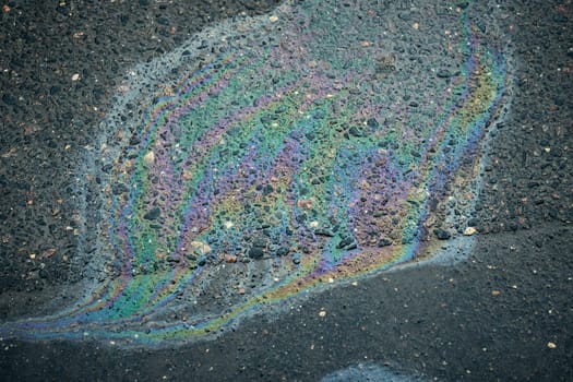 Multicolored oil spill forming an alluring abstract design