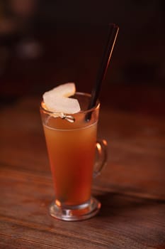 Beautiful photo of cocktail food. A bright juicy cocktail is on the table in the restaurant. Professional food photography.