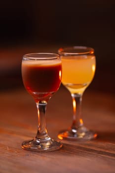 Beautiful photo of cocktail food. A bright juicy cocktail is on the table in the restaurant. Professional food photography.