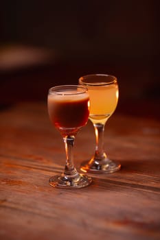 Beautiful photo of cocktail food. A bright juicy cocktail is on the table in the restaurant. Professional food photography.