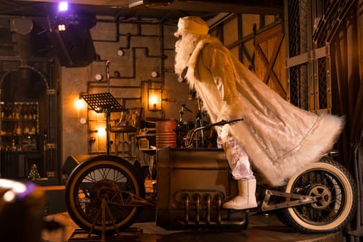 Side view of brutal Santa Claus in white clothes standing on vintage motorbike in grunge rock bar