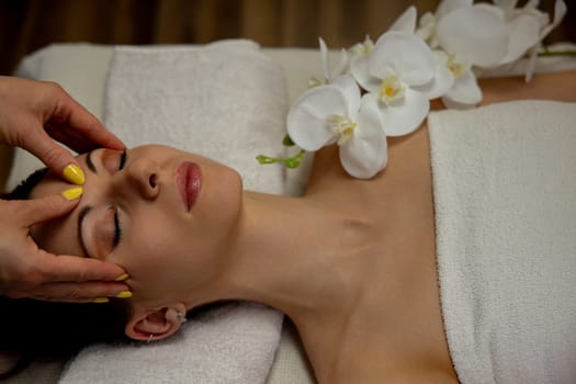 Indulge in a calming facial treatment featuring elegant orchids designed specifically for rejuvenation and relaxation