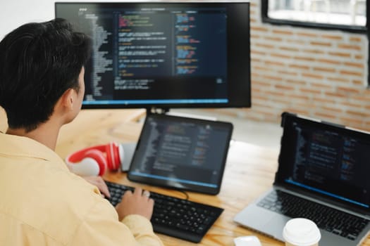 IT Programmer Starts Working on Desktop Computer. The Website Developer, Software Engineer Developing App, Video Game. Terminal with Coding Programming Language.